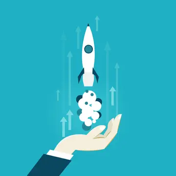 aus einer Hand startet eine Rakete senkrecht nach oben, begleitet von einer Dampfwolke.